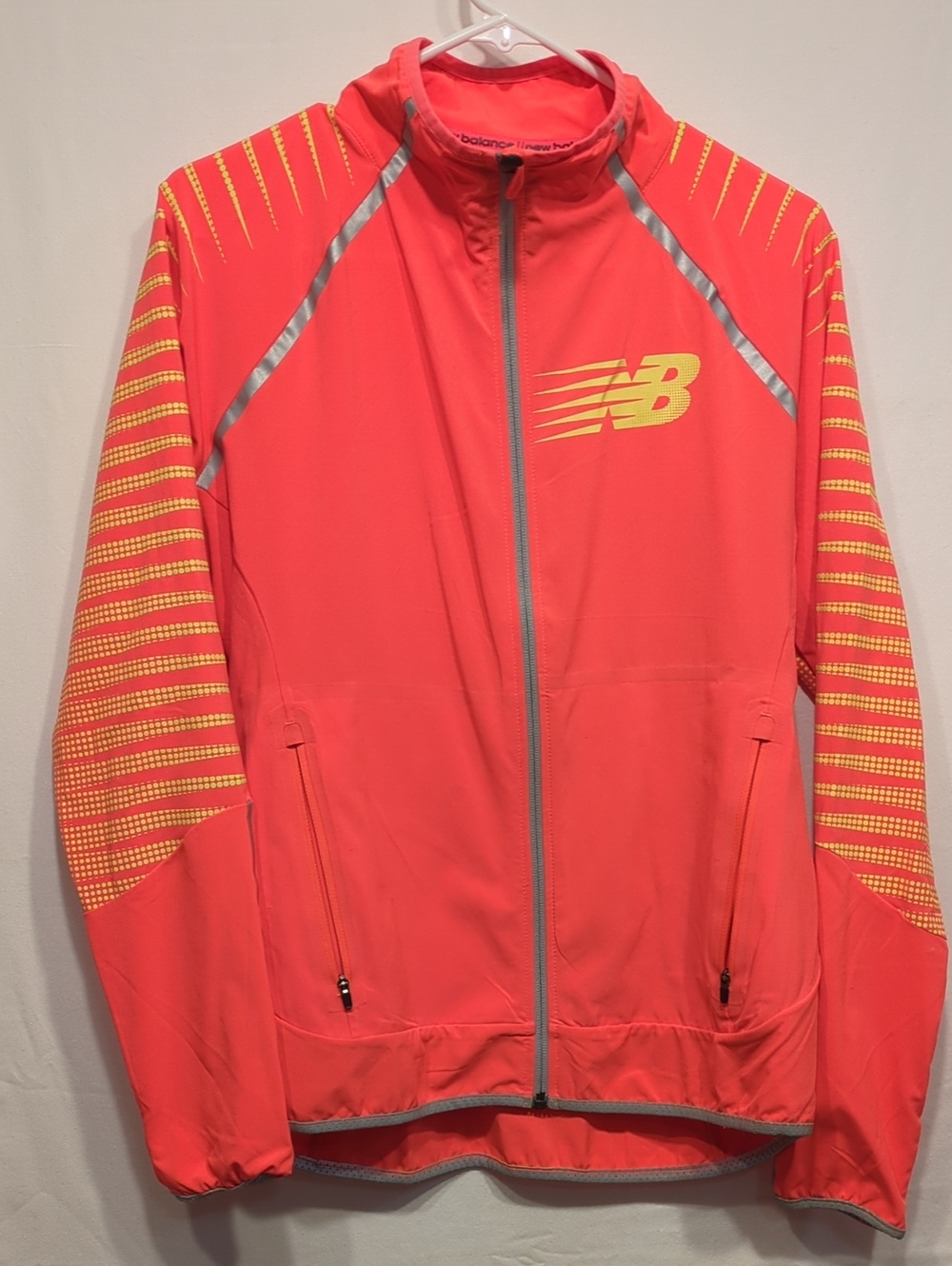 New Balance Coral-Red Performance Zip Jacket with Yellow Logo